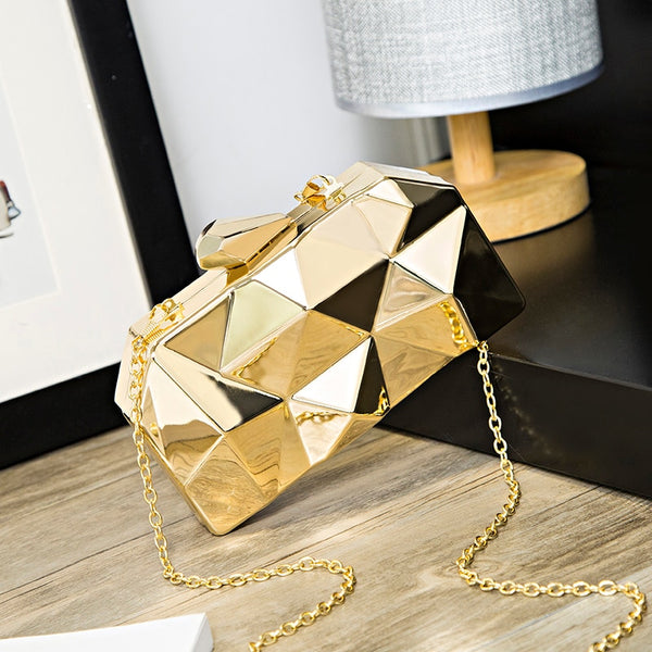 Shop this sleek geometric metallic clutch bag – versatile cross-body or statement purse, perfect for mobile, makeup, cards & 80s–90s glam