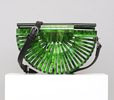 This Half Moon Bag is a half circle, acrylic basket design. This clutch bag is beautifully crafted, easy to clean and looks gorgeous. Removeable beaded or black cross over straps.