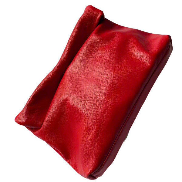  Experience luxurious craftsmanship with this Leather Folding Envelope Clutch. Incredibly soft it offers a beautiful, minimalistic design and a convenient foldable construction. 