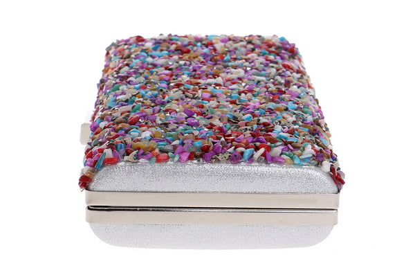 Colourfully tactile, the Ocean Candy Clutch Purse is sprinkled and coated with colored tiny acrylic crystals, stones, gemstones, beads and shells. With crossbody silver chain. 