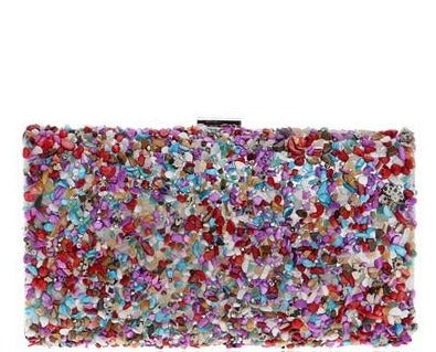 Colourfully tactile, the Ocean Candy Clutch Purse is sprinkled and coated with colored tiny acrylic crystals, stones, gemstones, beads and shells. With crossbody silver chain. 