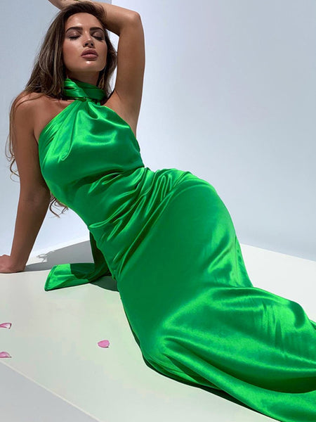 Elegant satin cling, backless halter maxi dress. This Gown is the perfect bodycon, long club, party dress with split up side for stride and dancing.