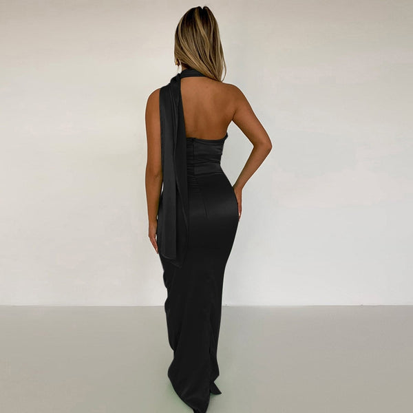 Elegant satin cling, backless halter maxi dress. This Gown is the perfect bodycon, long club, party dress with split up side for stride and dancing.