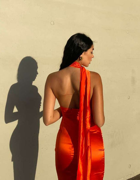 Elegant satin cling, backless halter maxi dress. This Gown is the perfect bodycon, long club, party dress with split up side for stride and dancing.