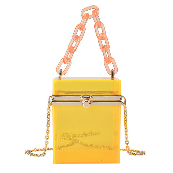 This Square Colored Acrylic Box Bag is very cool. It's a transparent acrylic square box tiny bag. In gorgeous colored acrylics. Also comes with hand chain and crossbody silver chain.