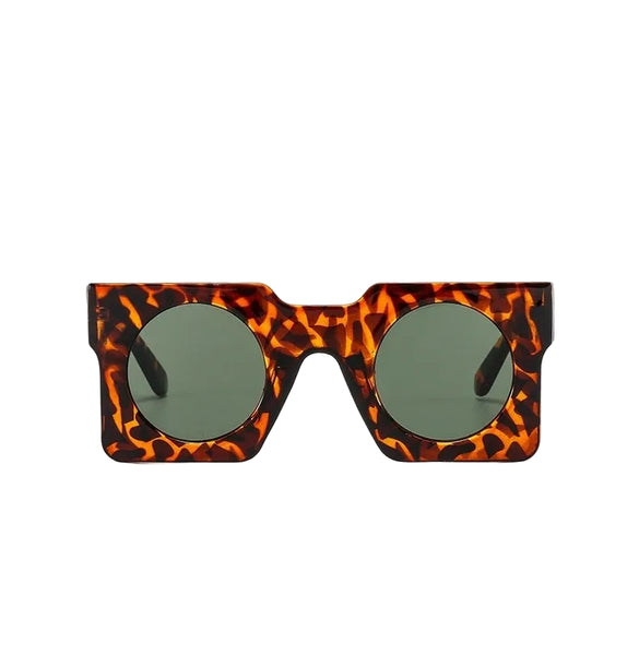 Pluto Square Sunglasses. Very retro, Italian 50s. Surreal and sassy.  You want to  get your hands on these boxy, looking glasses.