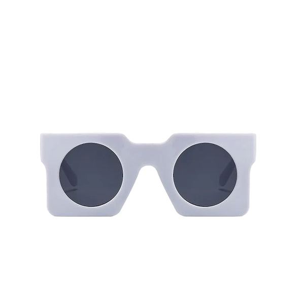 Pluto Square Sunglasses. Very retro, Italian 50s. Surreal and sassy.  You want to  get your hands on these boxy, looking glasses.
