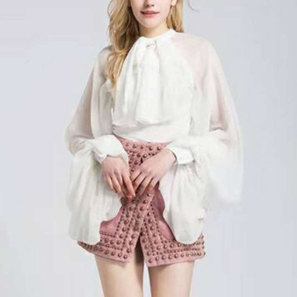 Wing Blouse - Source.At