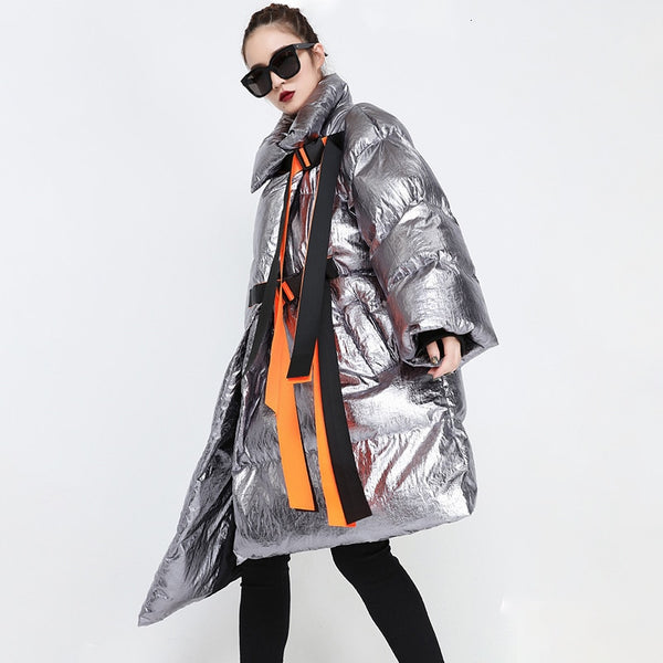 This high-performance Metallic Silver Puffer Asymmetric Jacket is designed with waterproof and windproof.