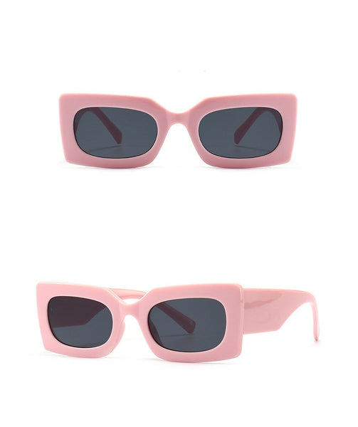The Molly Rectangle Sunglasses are a stylish accessory, featuring a lightweight, comfortable frame and 100% UV protection. 