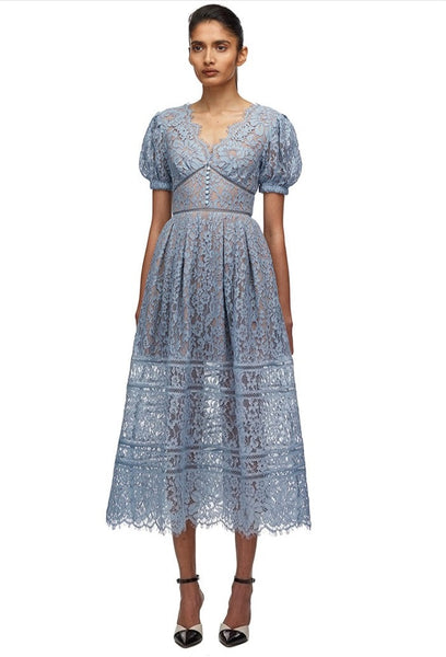 Mimi Lace Cocktail Dress is a puffed sleeve, flare skirt sheer embroidered lace cocktail party dress. Elegant midi A-Line skirt V-neck empire waistline with scallop hem