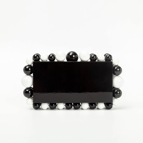 This Round Bead Acrylic Box Clutch is the perfect accessory for any night out. Its lightweight, yet sturdy acrylic material is adorned with intricate round beads, ensuring durability and a glamorous finish. The clutch has a sleek box silhouette perfect for adding a classic touch to your look.