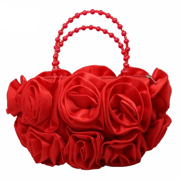 Rose sculptured satin tote bag for evening, day and very special occasions. In champagne, beige, black pink and red.  Main Material - Satin Closure Type - Zip Hardness - Soft Exterior - Open Pocket Lining Material - Satin Handles - Beaded