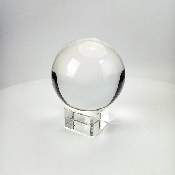 Clear crystal ball, with stand in a range of sizes. Channel pure energy, luck, fortune and health. Size - 60-120mm Color - Clear Stone - K9 crystal Technique - Polished